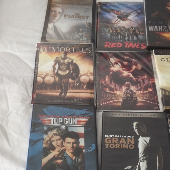 DVD set of 12 movies, includes 2 never opened - Picture 3 of 3